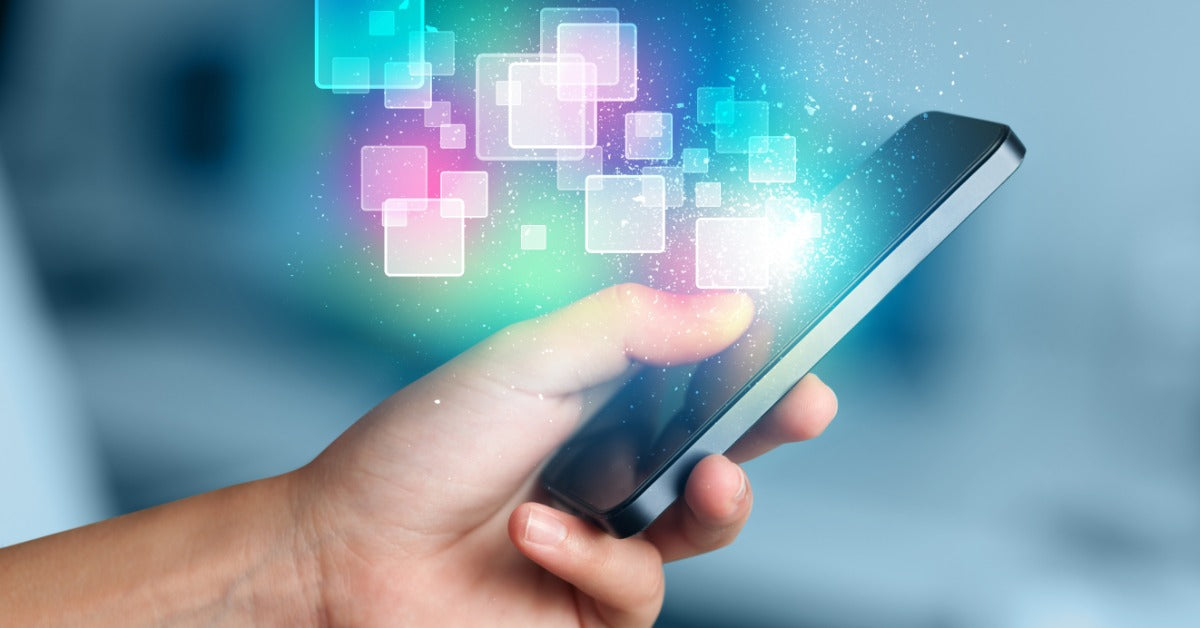 A hand holds a smartphone with glowing app tiles floating upward, representing smart control for connected home systems.